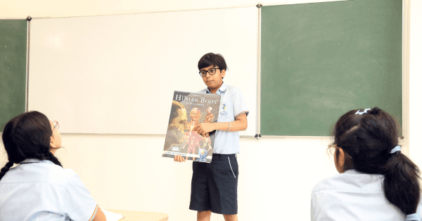 Student Leading a Group Activity in a Gurgaon School